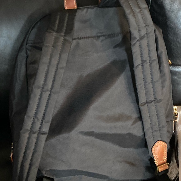 Frye black with leather accent
L17
Will fit my 13 in dell and larger - Picture 4 of 10